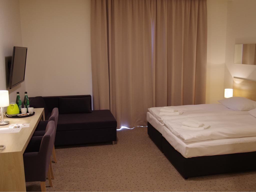 Hotel Uniejow Oda fotoğraf